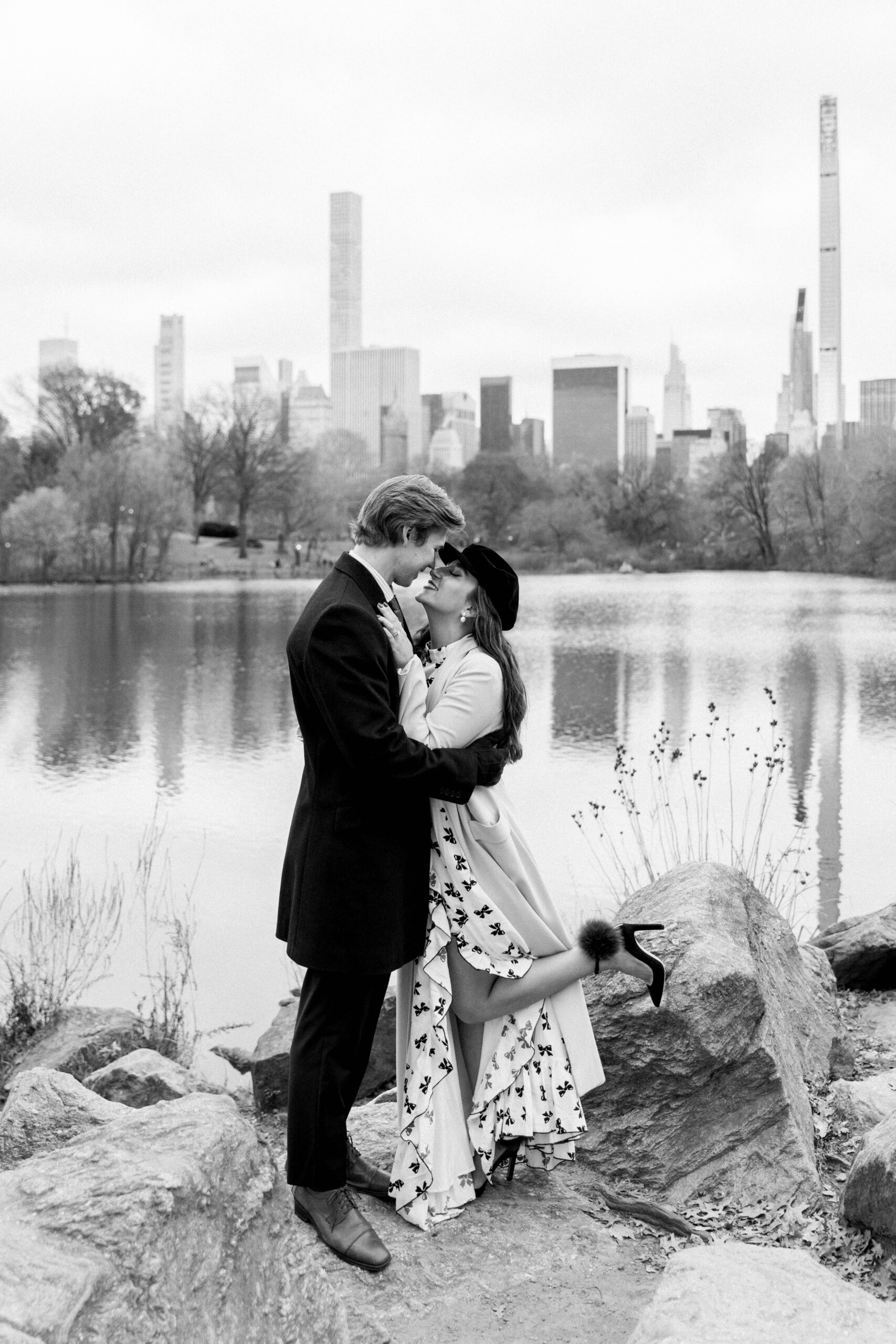a-happy-couple-posing-for-engagement-photos-in-new-york-city